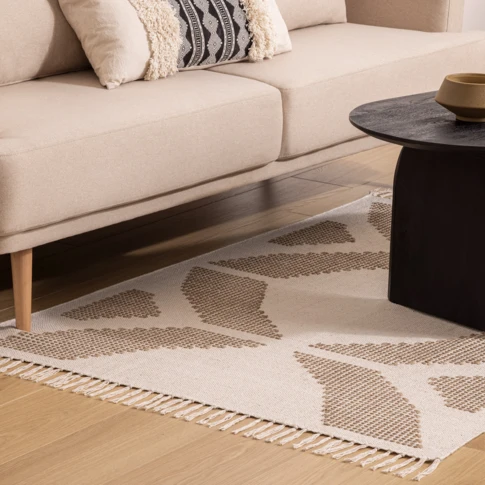 Tapis Inuit en coton avec motif en relief brodé