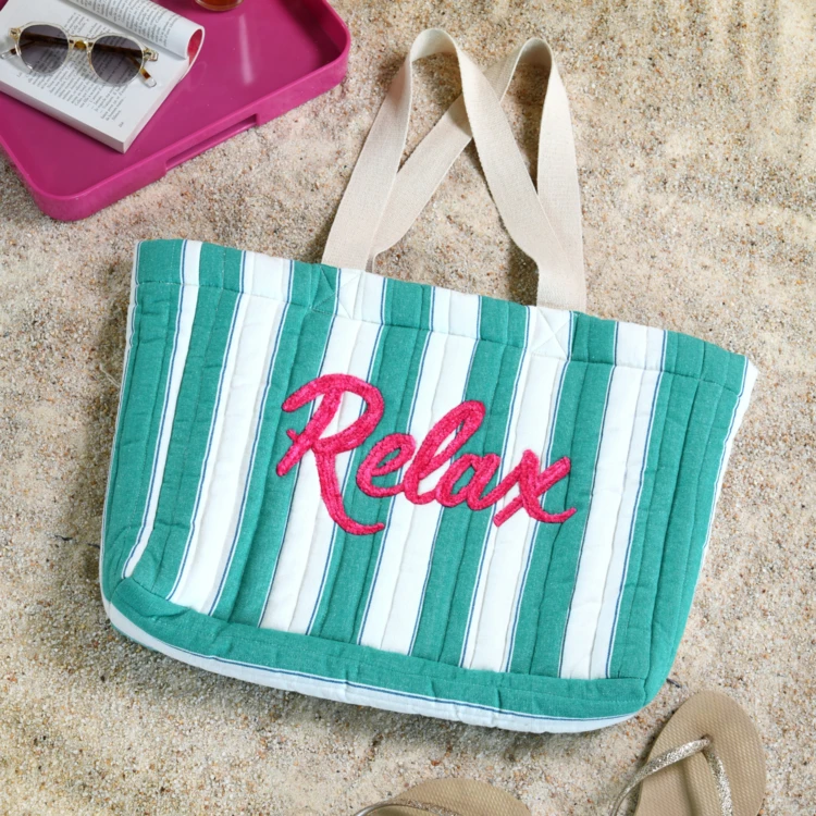 Bolsa de mano acolchada bordada "Relax"