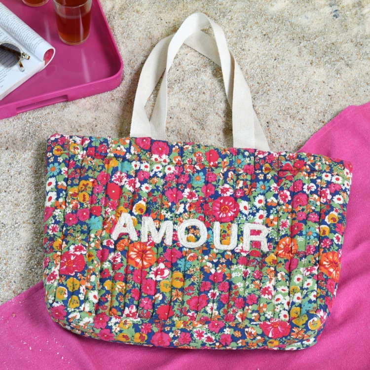 Bolsa de mano acolchada con estampado floral "AMOUR"